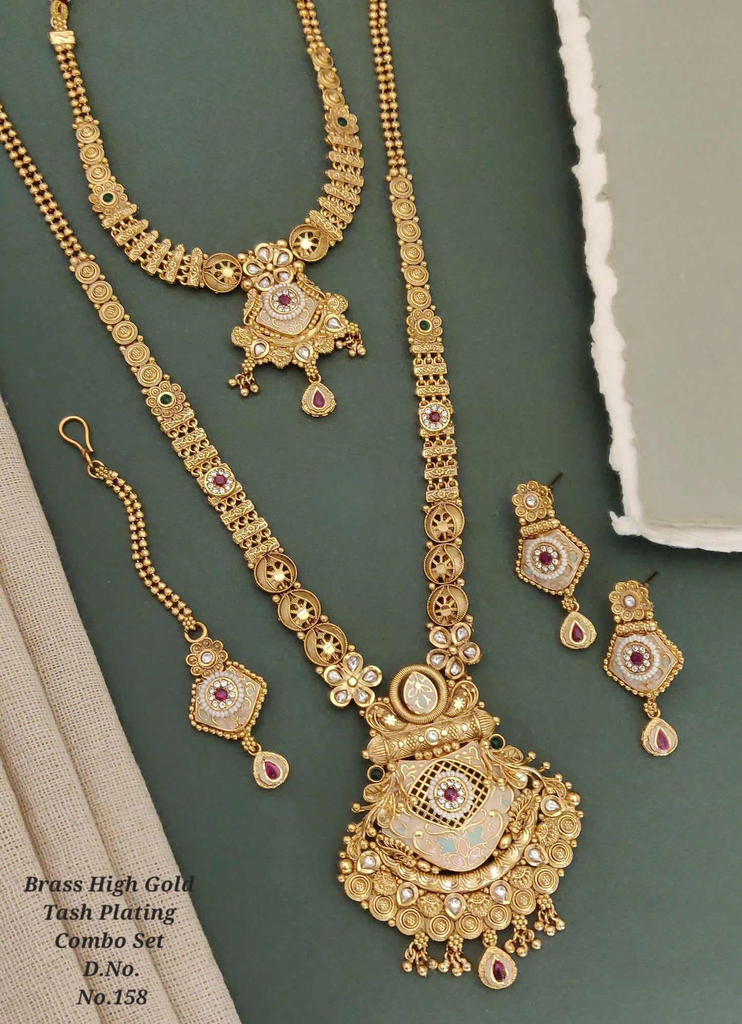 Brass high gold plated traditional combo jewelry set with intricate designs and gemstone accents