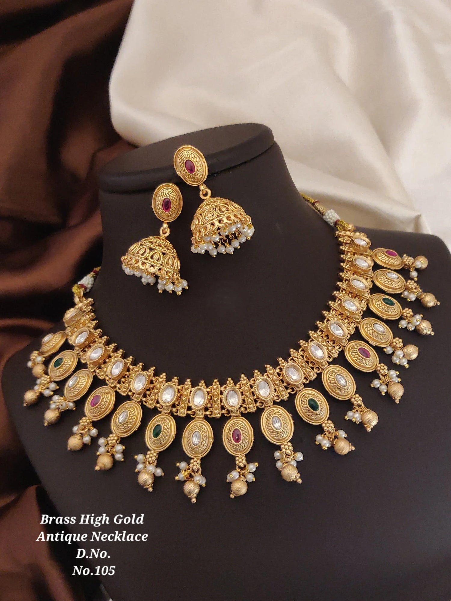 Brass high gold antique necklace set with green and red stones and matching jhumka earrings