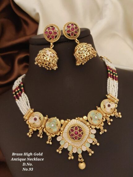 Brass high gold antique necklace with matching earrings featuring floral designs and pearls